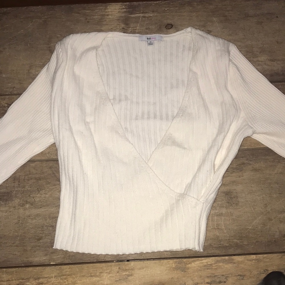 NWOT size medium cream colored wrap cropped sweater